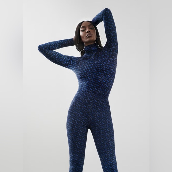 Seen Naomi Campbell- Authentic BURBERRY  TB Monogram Print Long-Sleeve Bodysuit - Picture 5 of 9